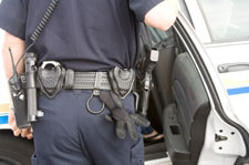 arrest car police officer handcuffs