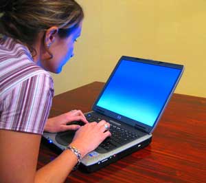 woman-typing-laptop